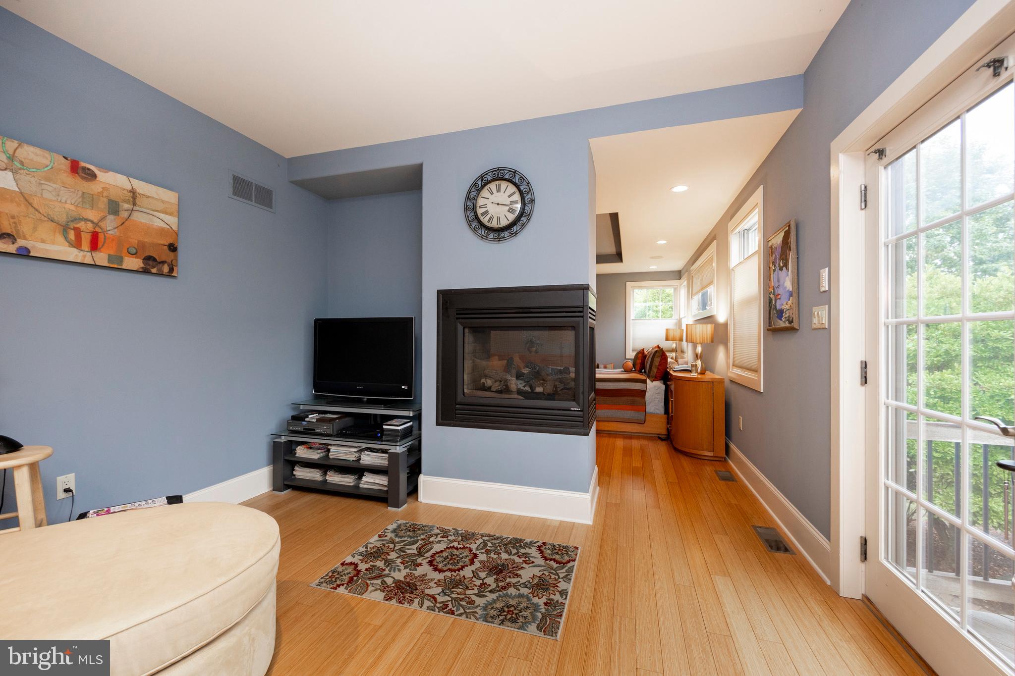 1720 St Peters Road Pottstown, PA 19465 - Photo 24 of 65 a living room with furniture a fireplace and a flat screen tv