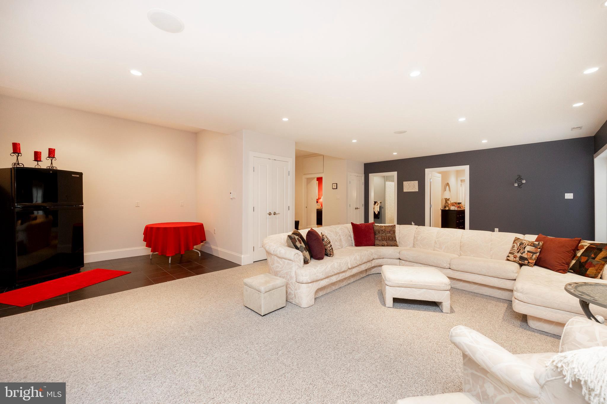 1720 St Peters Road Pottstown, PA 19465 - Photo 32 of 65 a living room with furniture and a flat screen tv