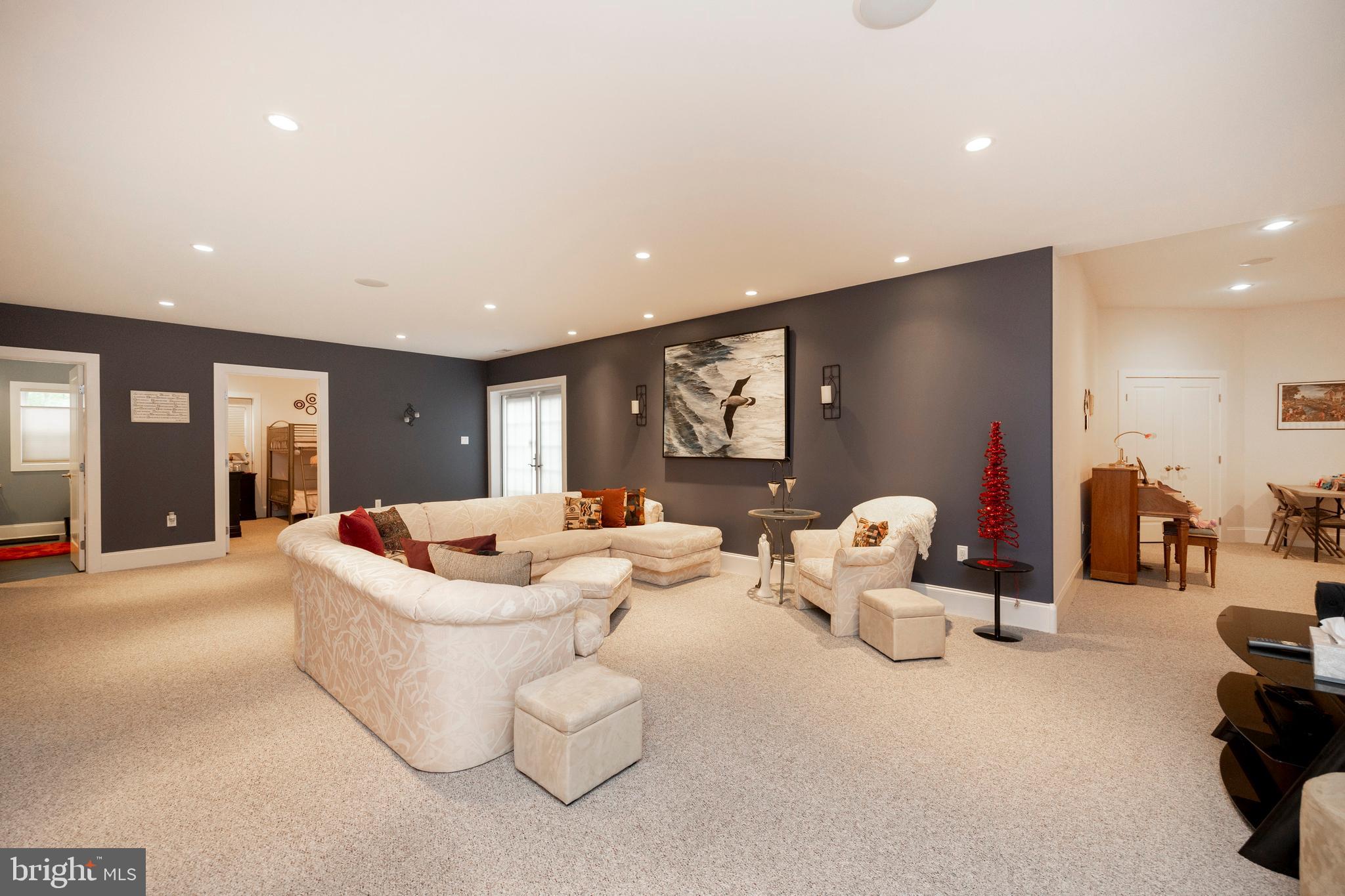 1720 St Peters Road Pottstown, PA 19465 - Photo 33 of 65 a living room with furniture and large mirror