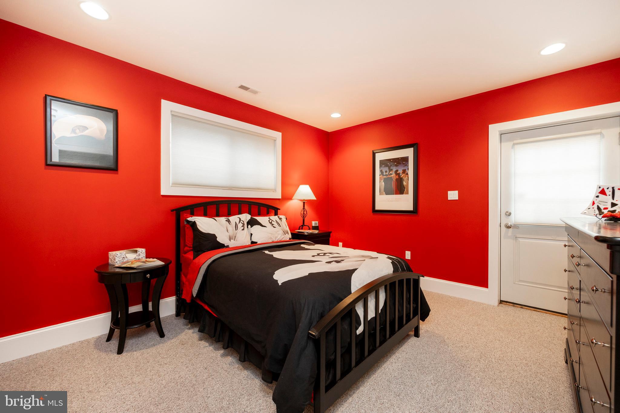 1720 St Peters Road Pottstown, PA 19465 - Photo 37 of 65 a bedroom with a bed and a table in it