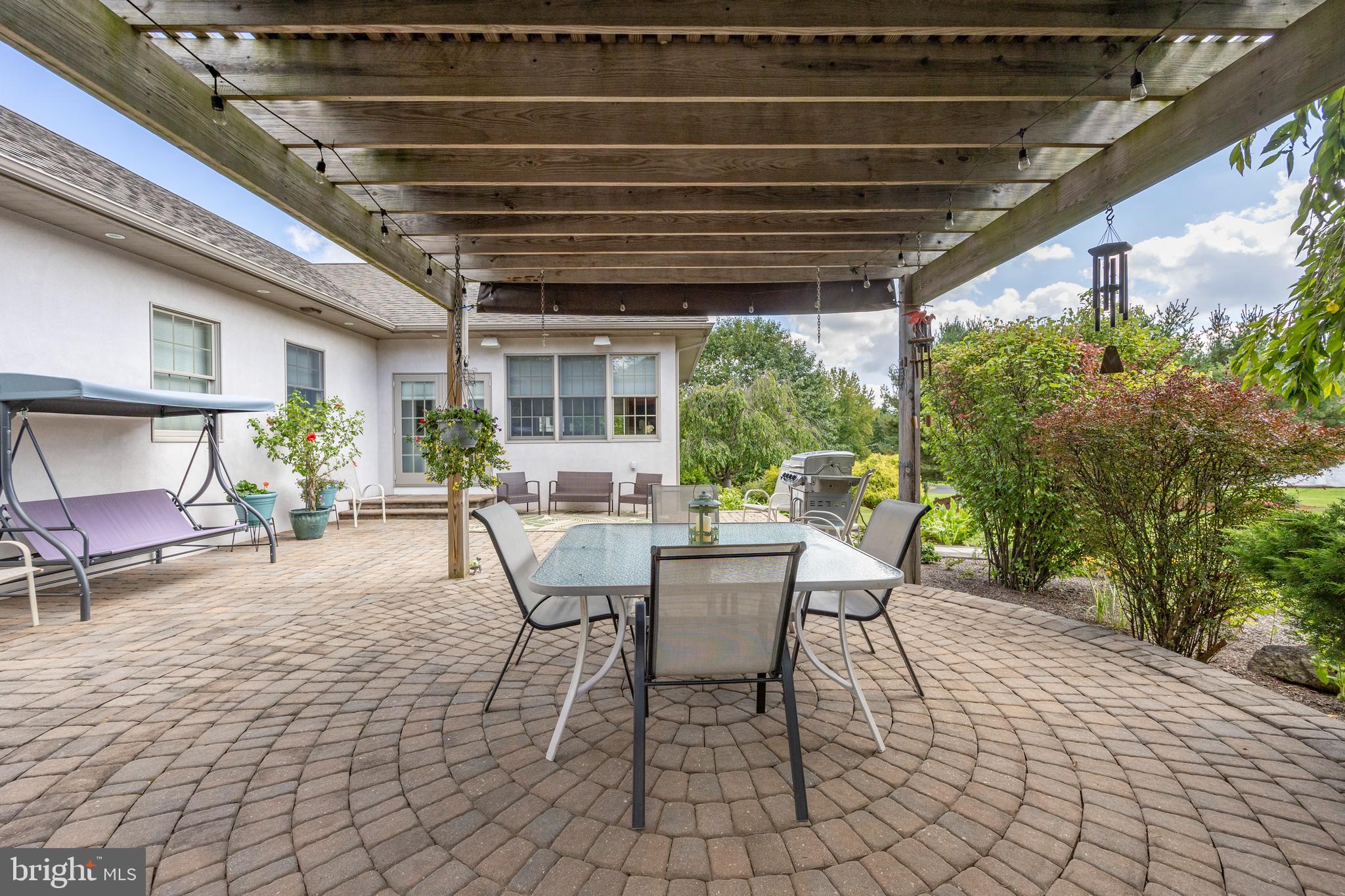 1720 St Peters Road Pottstown, PA 19465 - Photo 49 of 65 a view of a porch with furniture and a yard