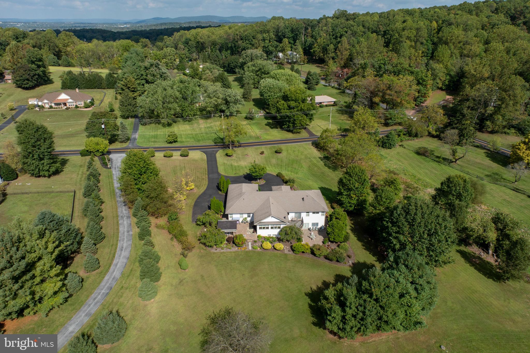 1720 St Peters Road Pottstown, PA 19465 - Photo 59 of 65 an aerial view of a residential houses with outdoor space and trees all around