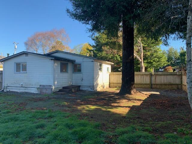 4040 Cedar Street Cutten, CA 95503 - Photo 14 of 21 a view of a backyard with a large tree