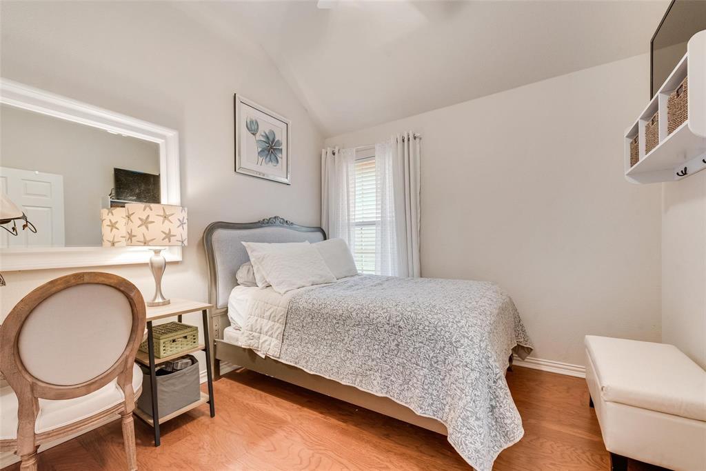 101 Cassandra Drive Forney, TX 75126 - Photo 15 of 21 a bedroom with a bed chair and a window