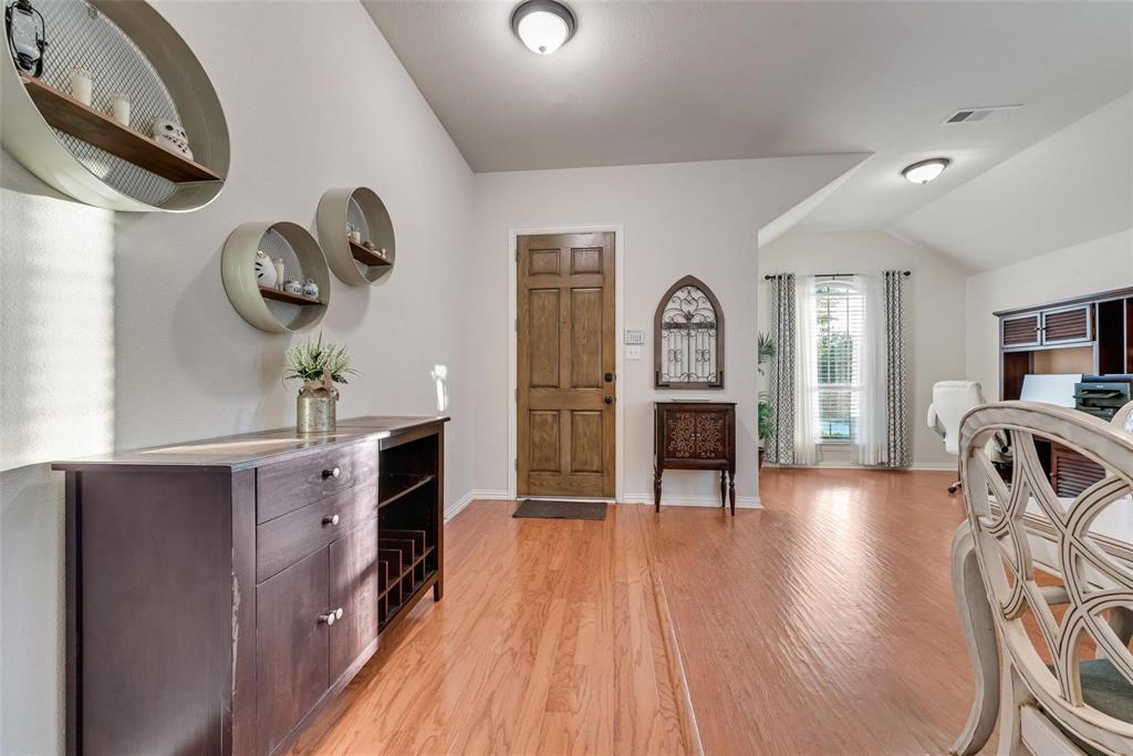 101 Cassandra Drive Forney, TX 75126 - Photo 3 of 21 a view of a livingroom with furniture and a fireplace