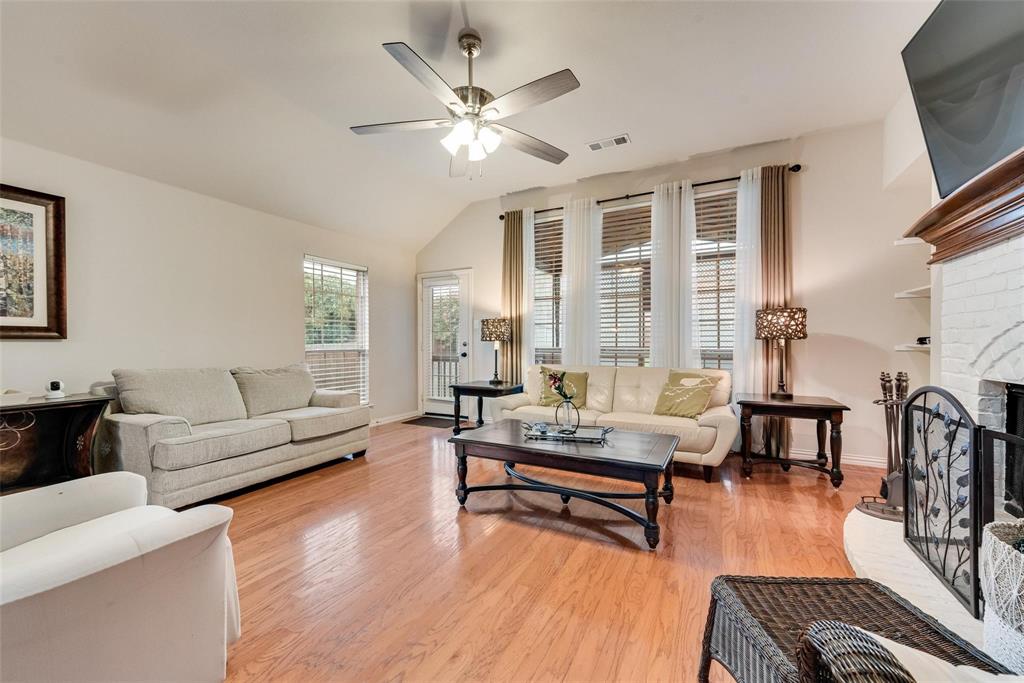 101 Cassandra Drive Forney, TX 75126 - Photo 9 of 21 a living room with furniture and a wooden floor