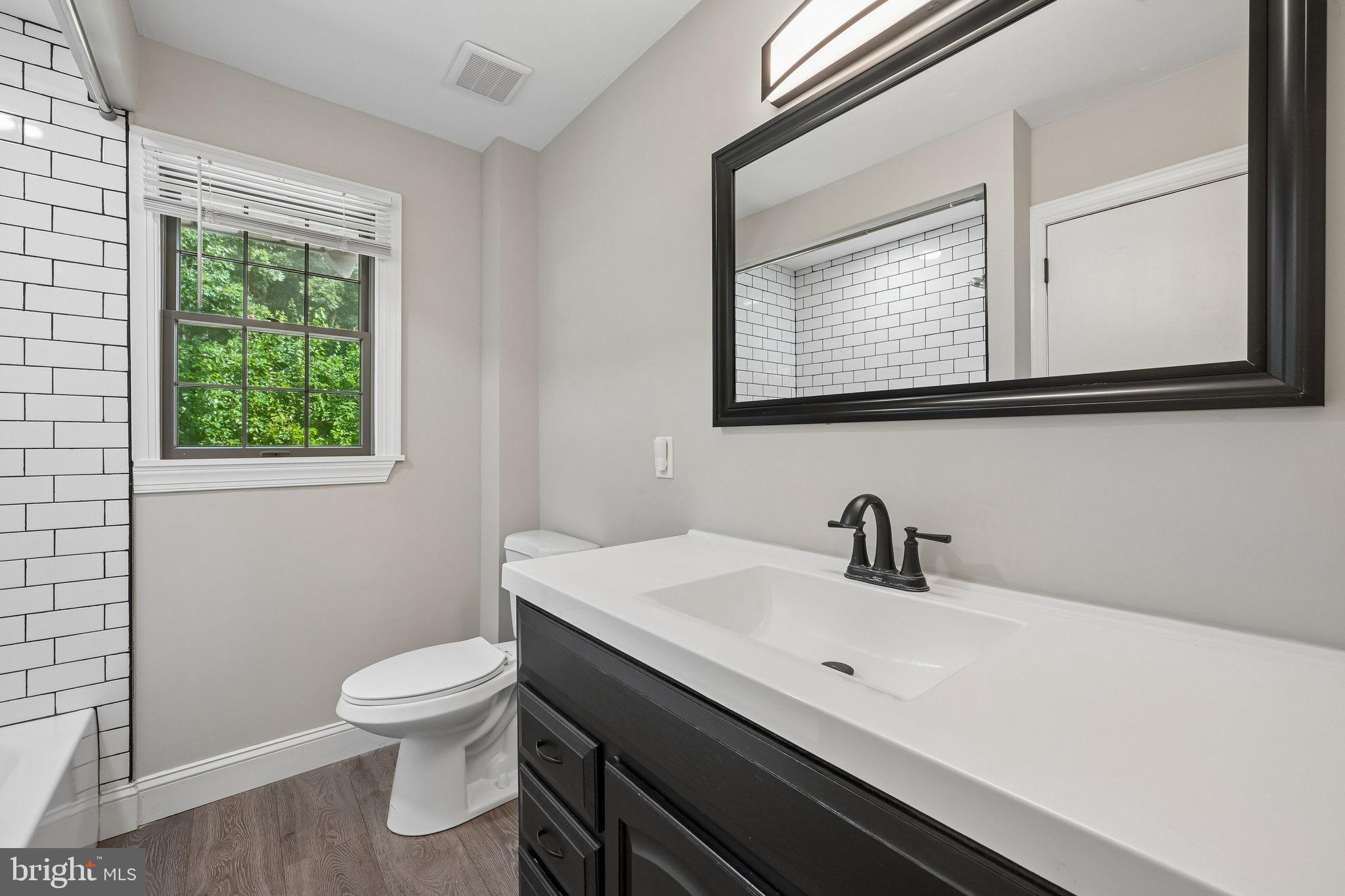 2 Farwood Road Gibbsboro, NJ 08026 - Photo 16 of 25 a bathroom with a toilet sink and mirror