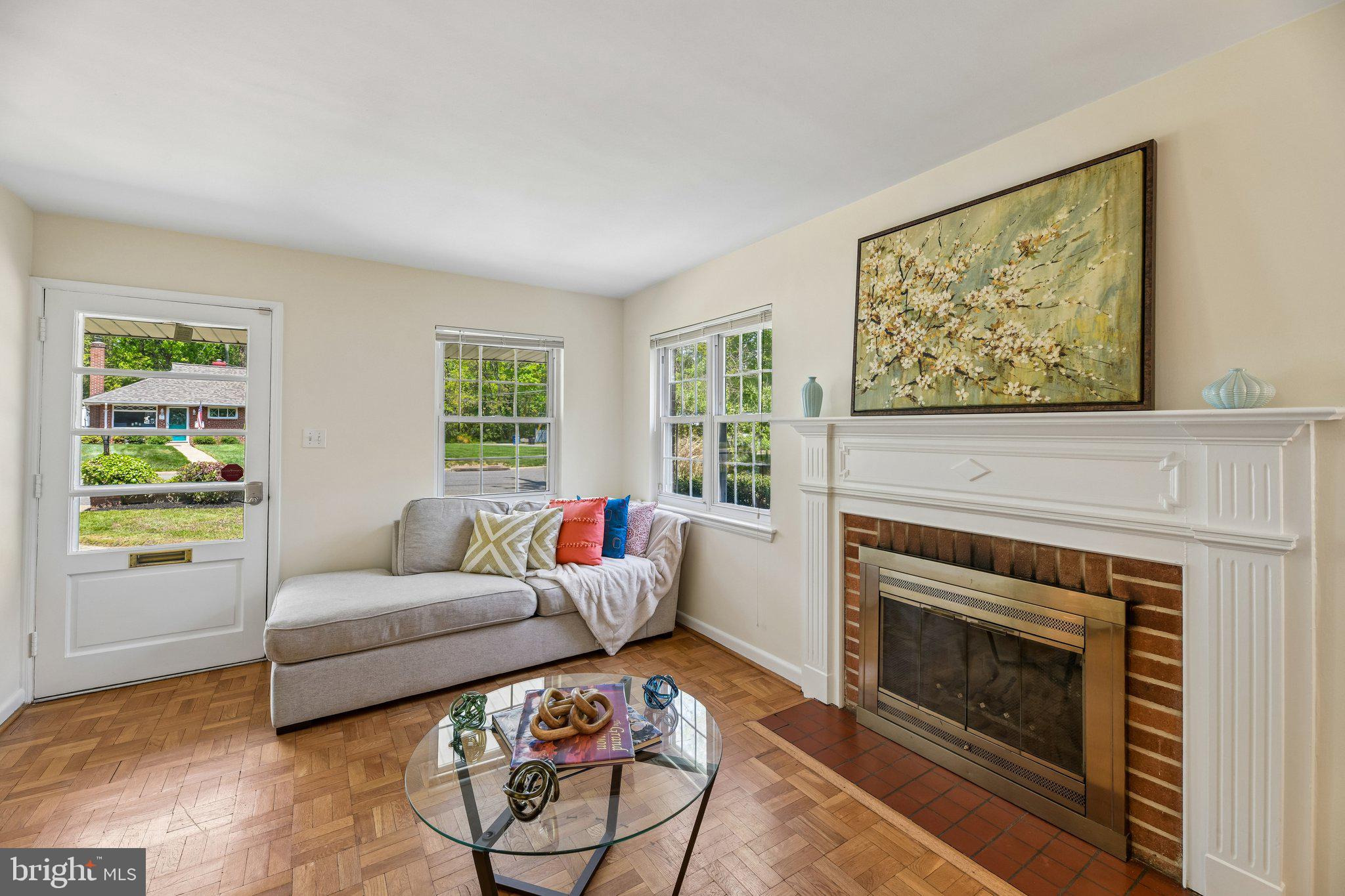 31 South Edison Street Arlington, VA 22204 - Photo 12 of 60 a living room with furniture a window and a fireplace