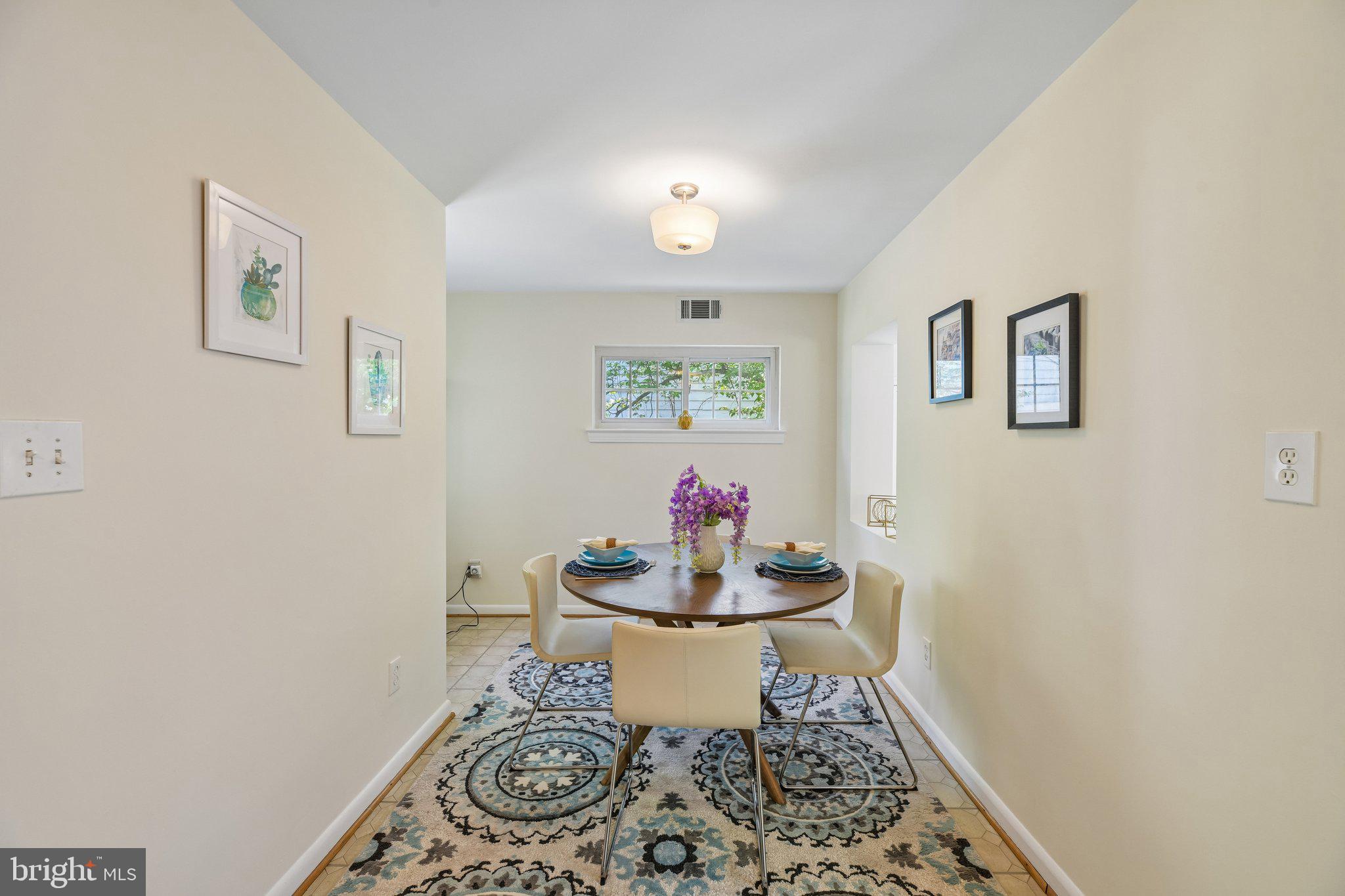 31 South Edison Street Arlington, VA 22204 - Photo 15 of 60 a dining room with table and chair
