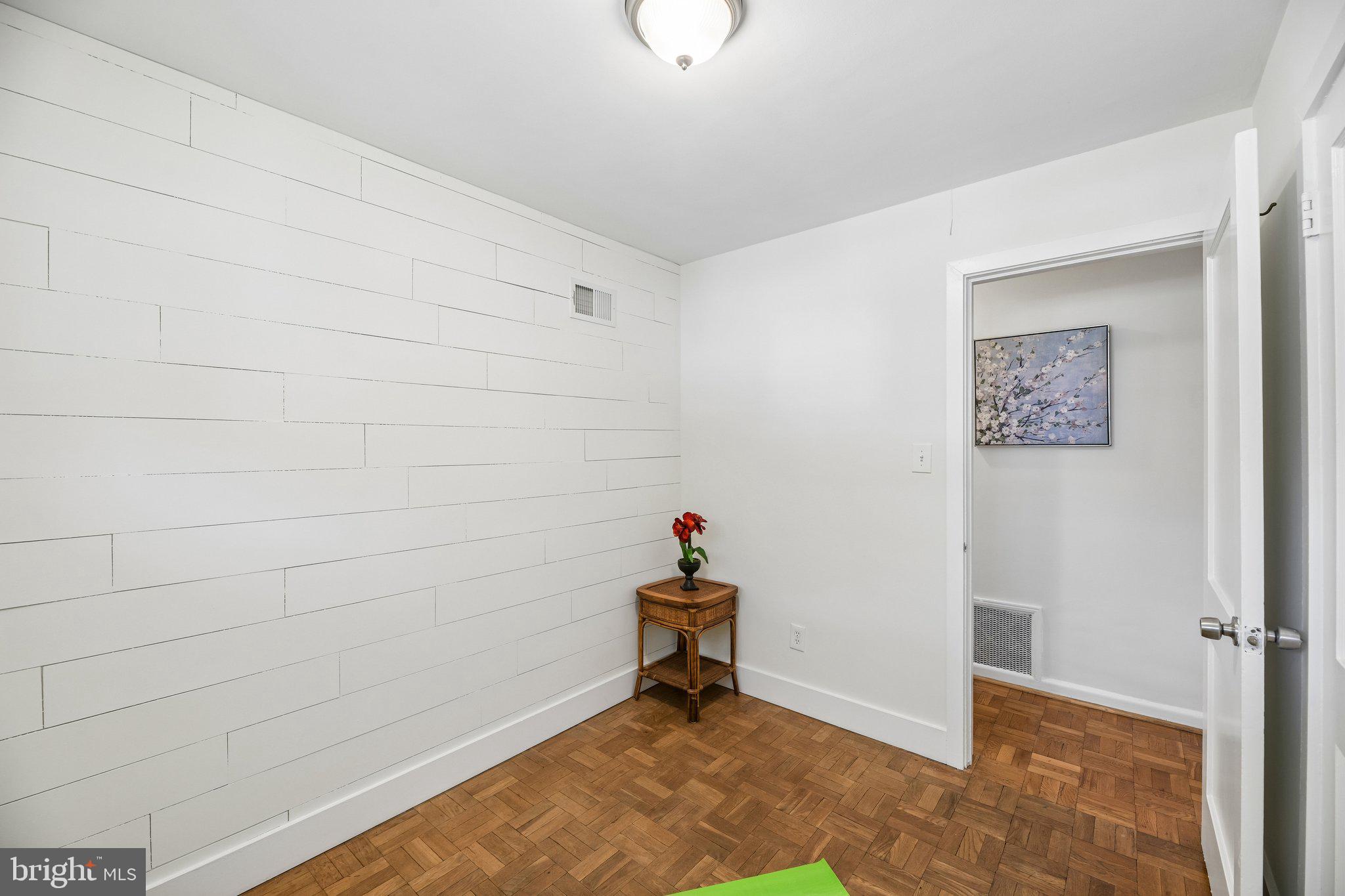 31 South Edison Street Arlington, VA 22204 - Photo 40 of 60 a room that has a bed and a window