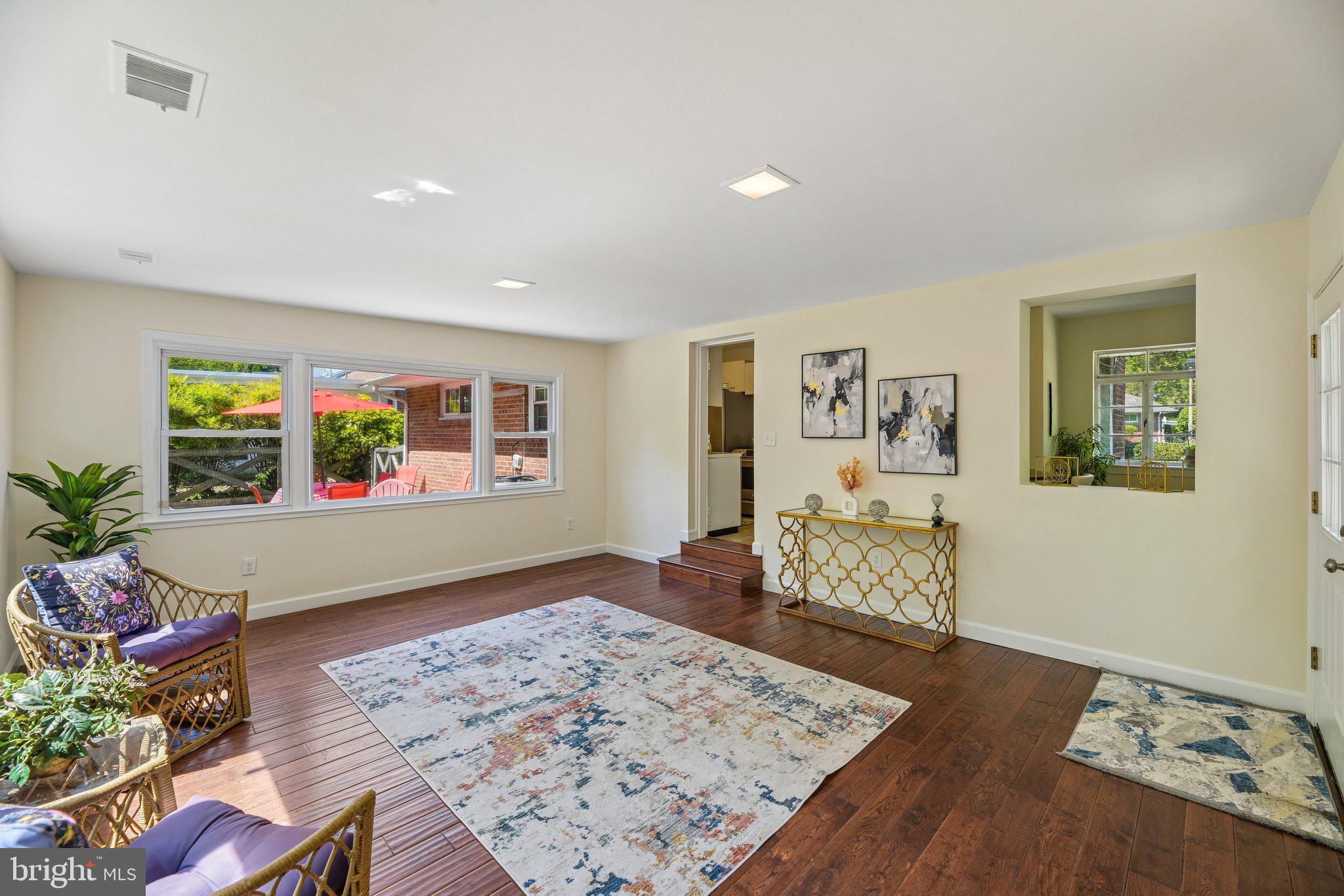 31 South Edison Street Arlington, VA 22204 - Photo 47 of 60 a living room with furniture and a wooden floor