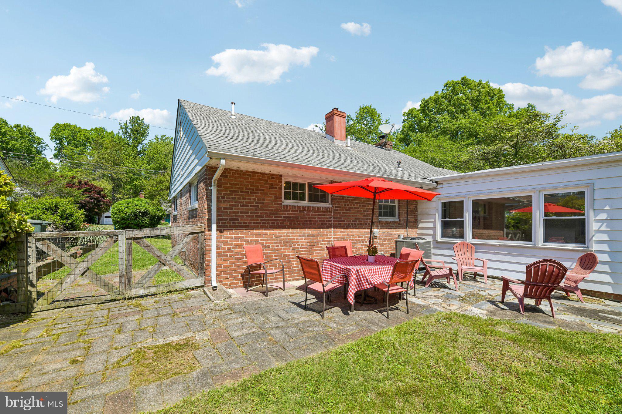 31 South Edison Street Arlington, VA 22204 - Photo 52 of 60 a view of a house with backyard sitting area and garden