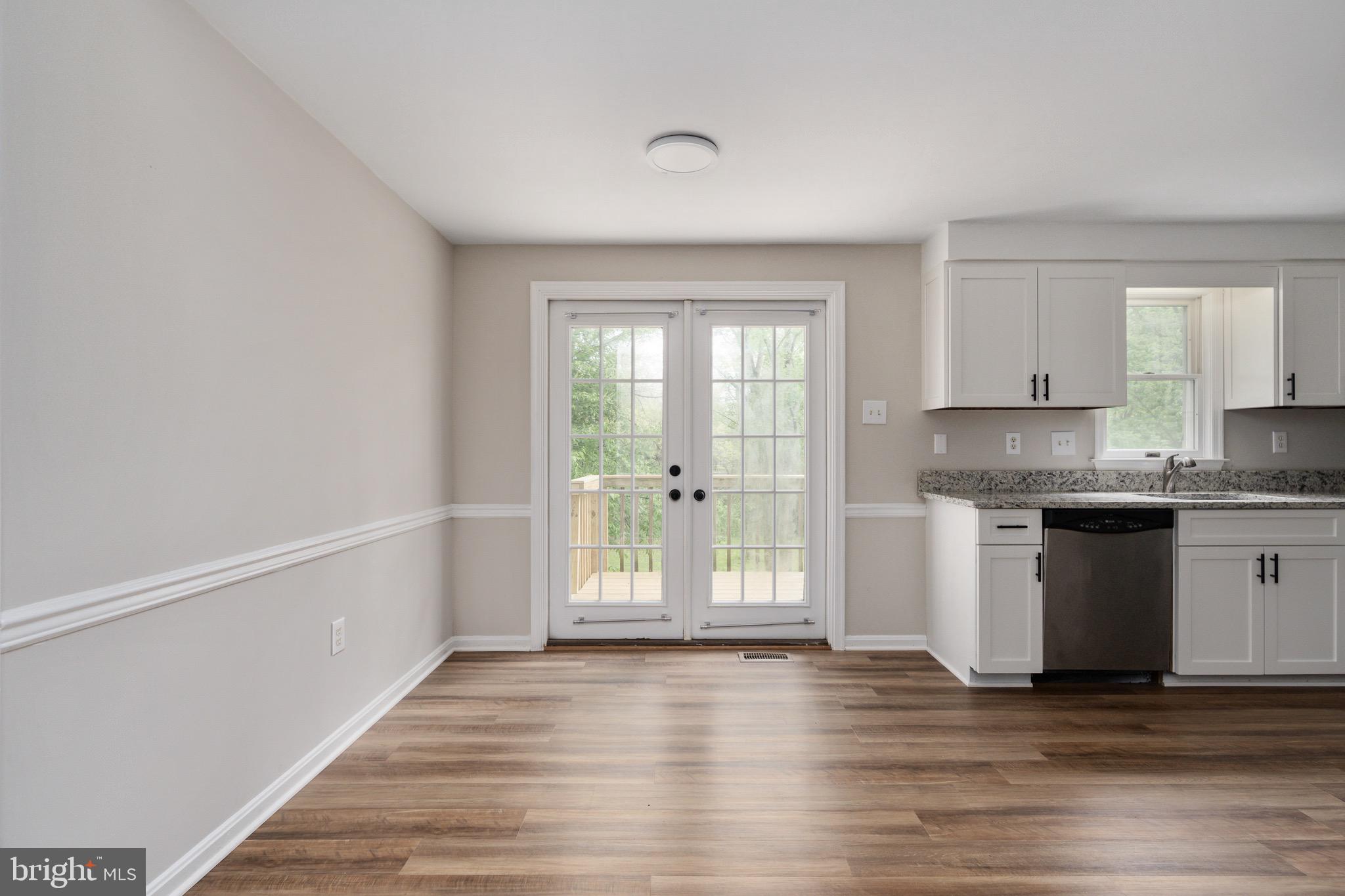 9613 Routts Hill Road Warrenton, VA 20186 - Photo 20 of 63 kitchen looking out to brand new deck