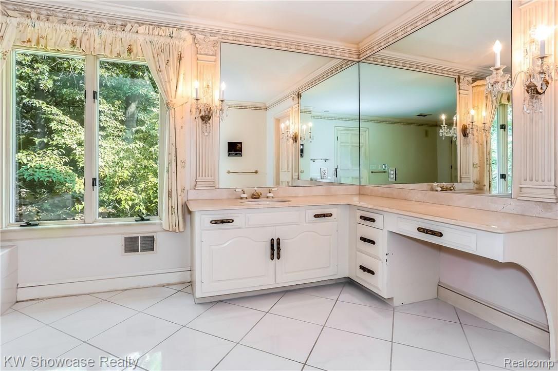 1900 East Vly Road Bloomfield Hills, MI 48304 - Photo 32 of 68 Ladies Master Bathroom Vanity overlooking backyard
