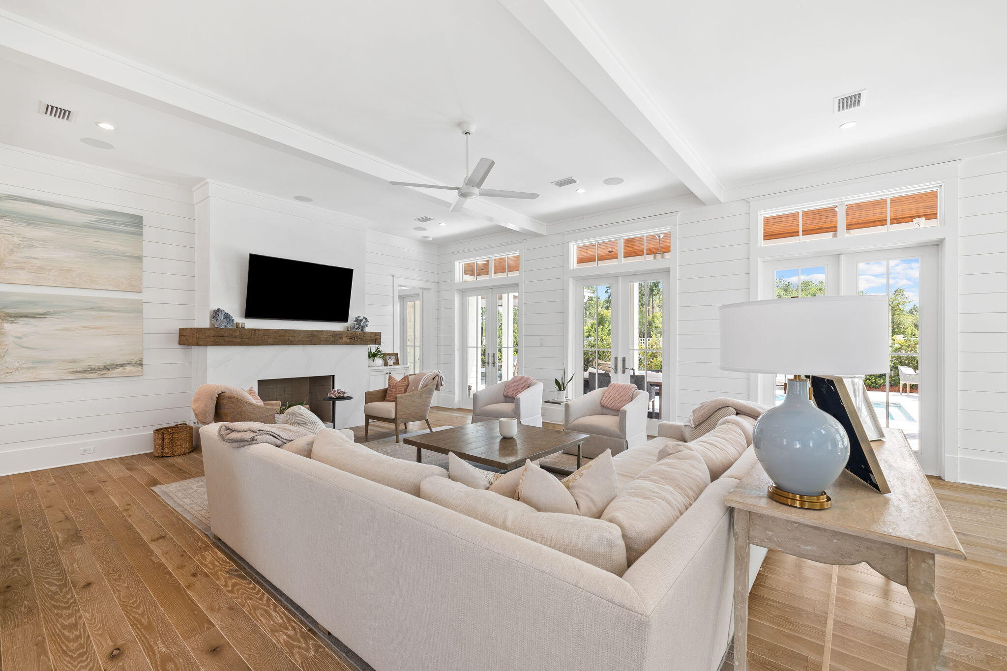 12 Needle Cast Ln Inlet Beach Inlet Beach, FL 32461 - Photo 15 of 74 a living room with furniture a flat screen tv and a fireplace