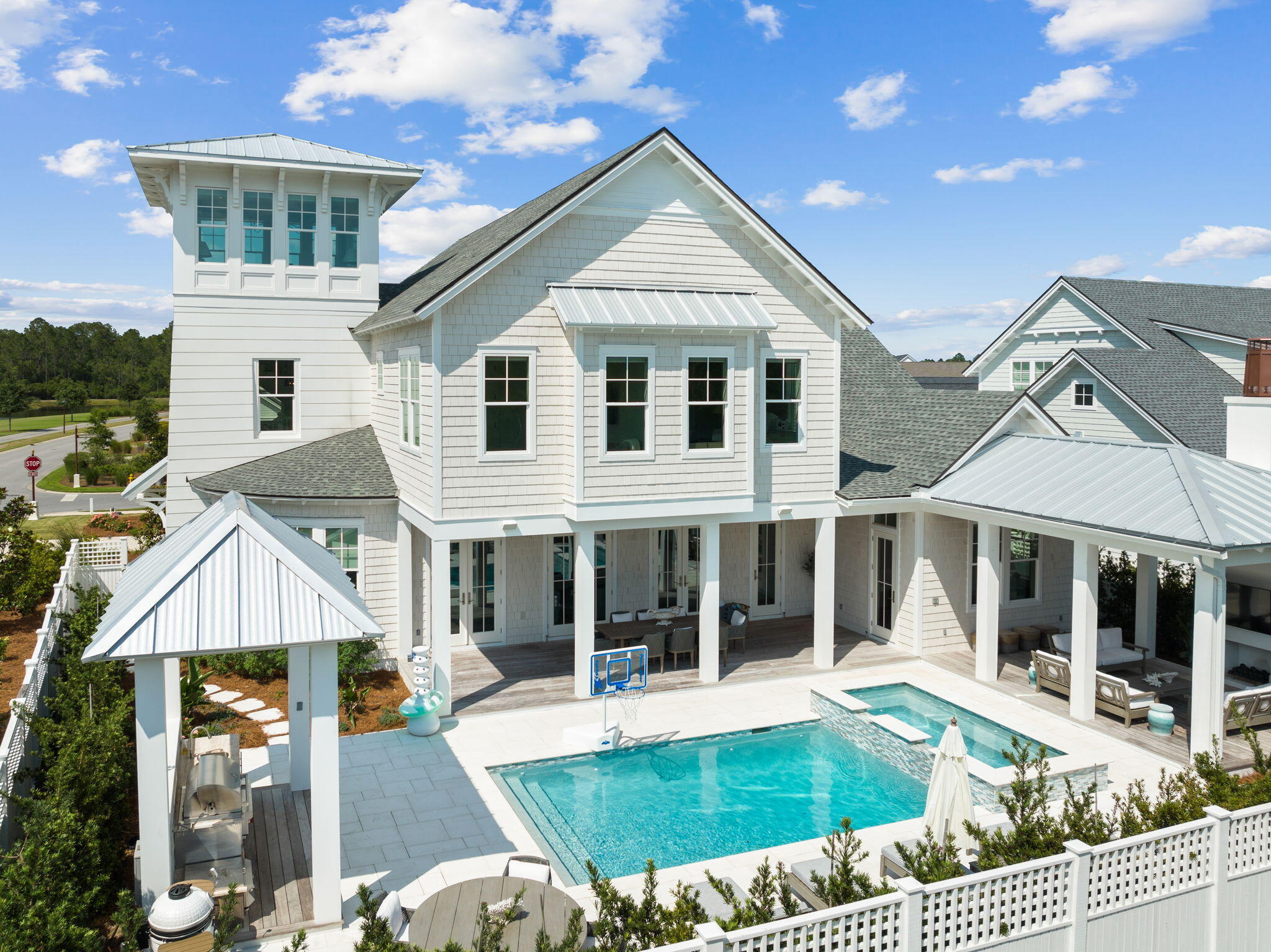 12 Needle Cast Ln Inlet Beach Inlet Beach, FL 32461 - Photo 3 of 74 a front view of a house with swimming pool and glass windows