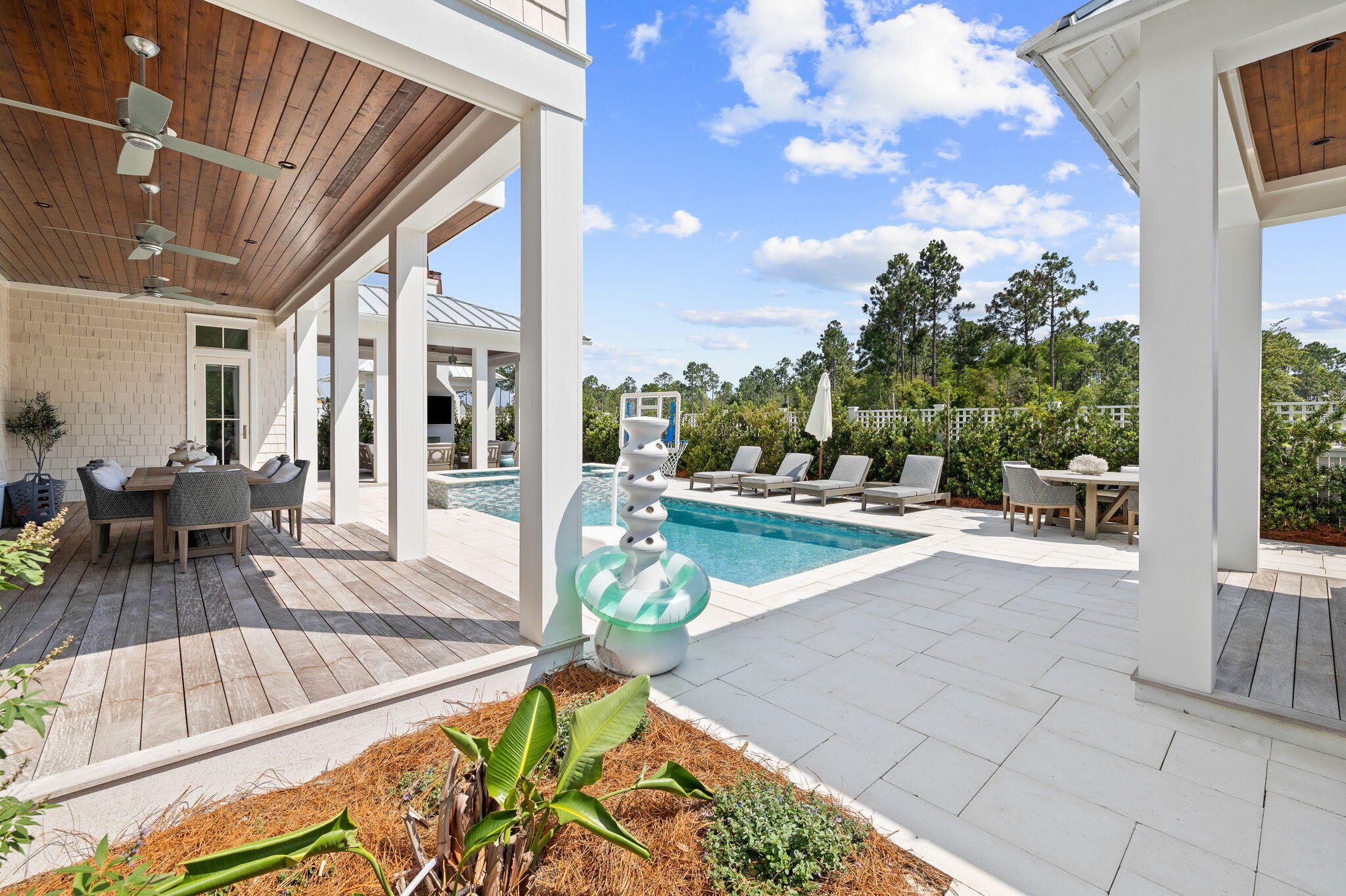 12 Needle Cast Ln Inlet Beach Inlet Beach, FL 32461 - Photo 57 of 74 a view of a patio with dining table and chairs with wooden floor