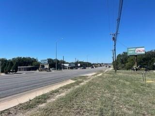 0 Early Boulevard Early, TX 76802 - Photo 2 of 9 a view of a road with a yard