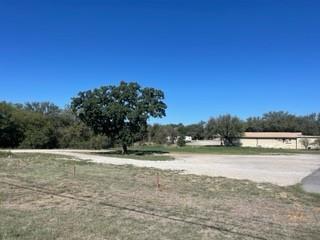 0 Early Boulevard Early, TX 76802 - Photo 7 of 9 a view of swimming pool with mountain in the background