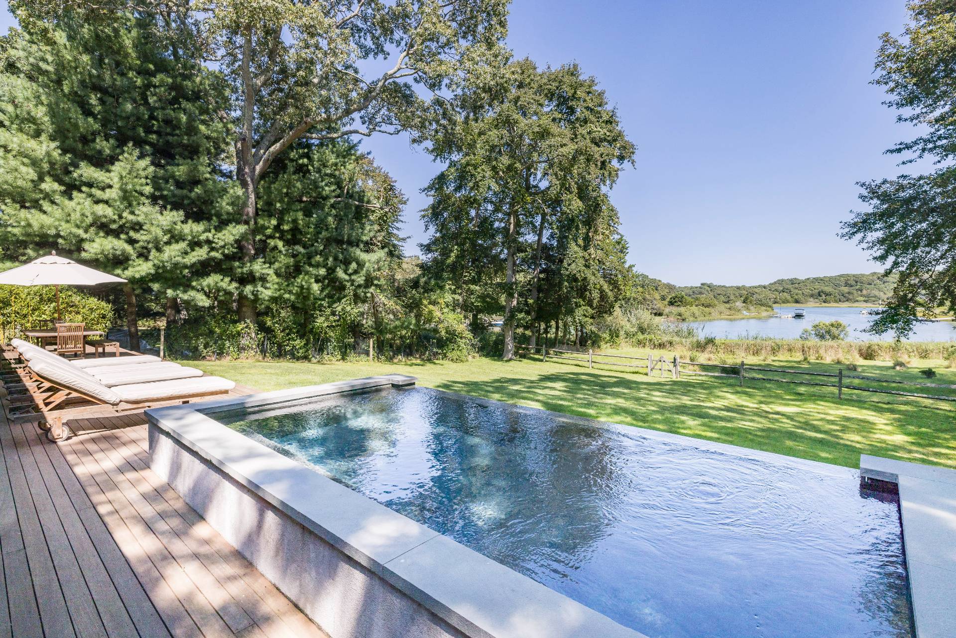 26 Oyster Shores Road East Hampton, NY 11937 - Photo 4 of 17 a view of a yard with an outdoor space
