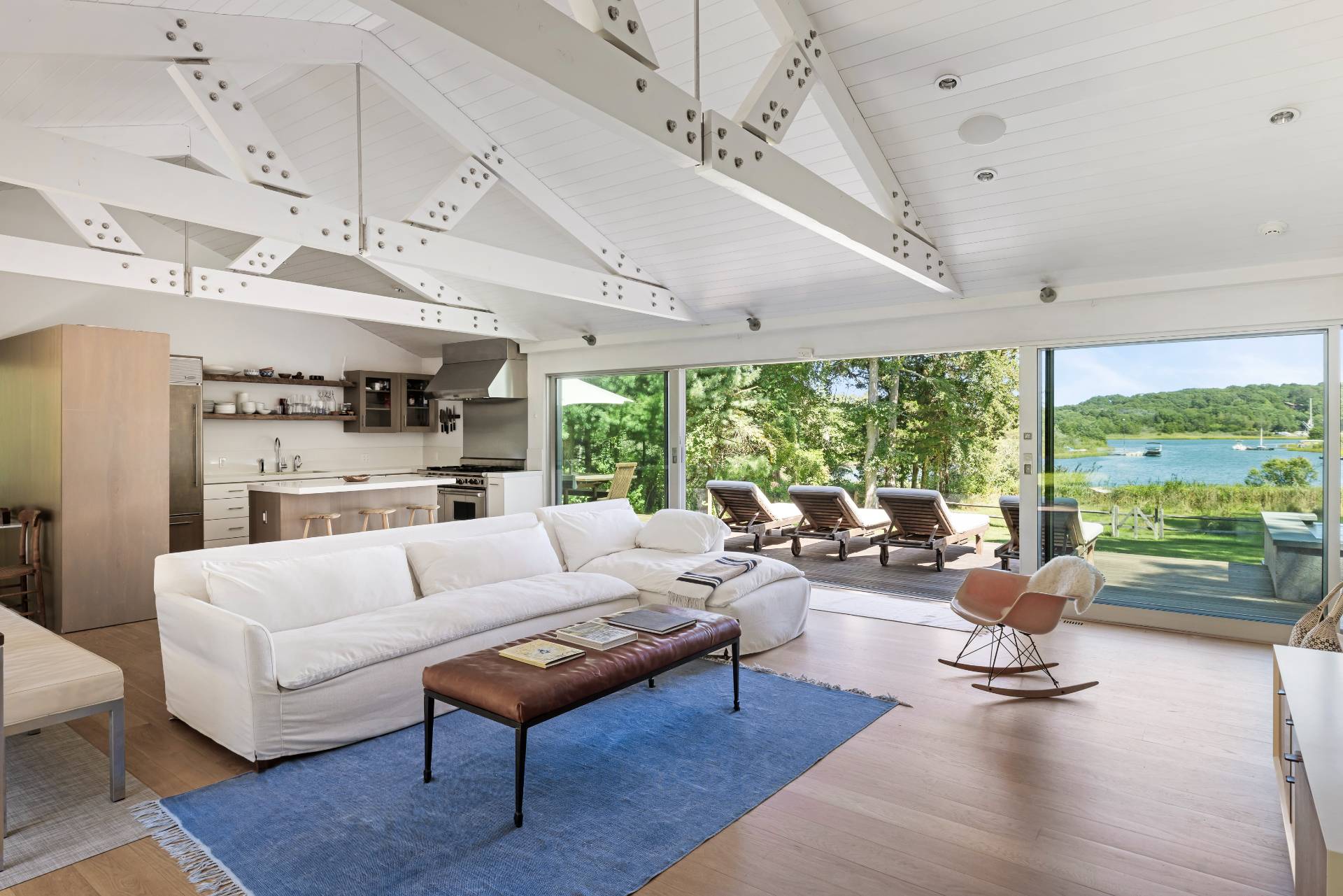 26 Oyster Shores Road East Hampton, NY 11937 - Photo 6 of 17 a living room with furniture and a large window