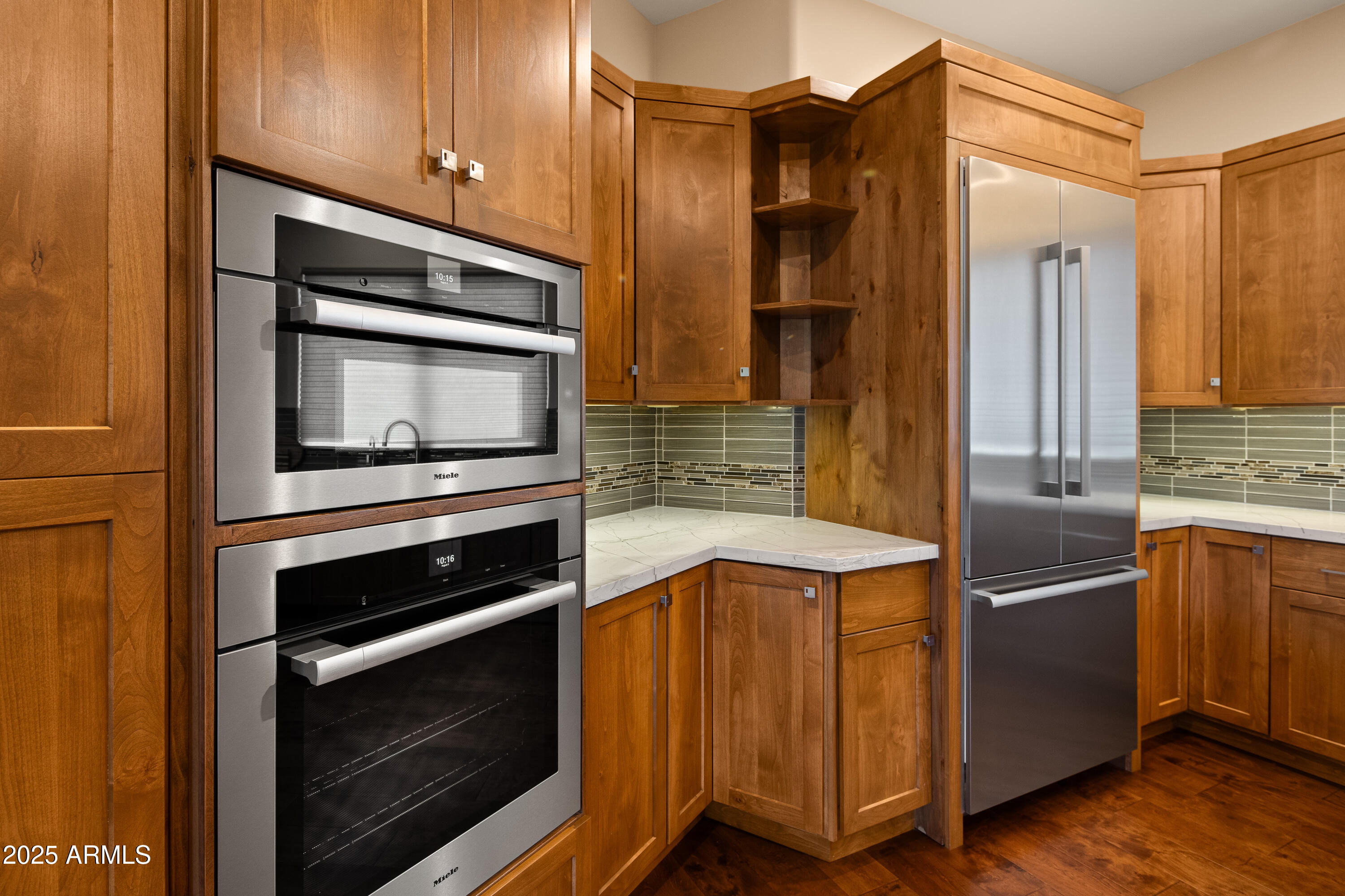 150 Rimstone Circle Sedona, AZ 86336 - Photo 16 of 38 a kitchen with stainless steel appliances granite countertop a stove and a microwave