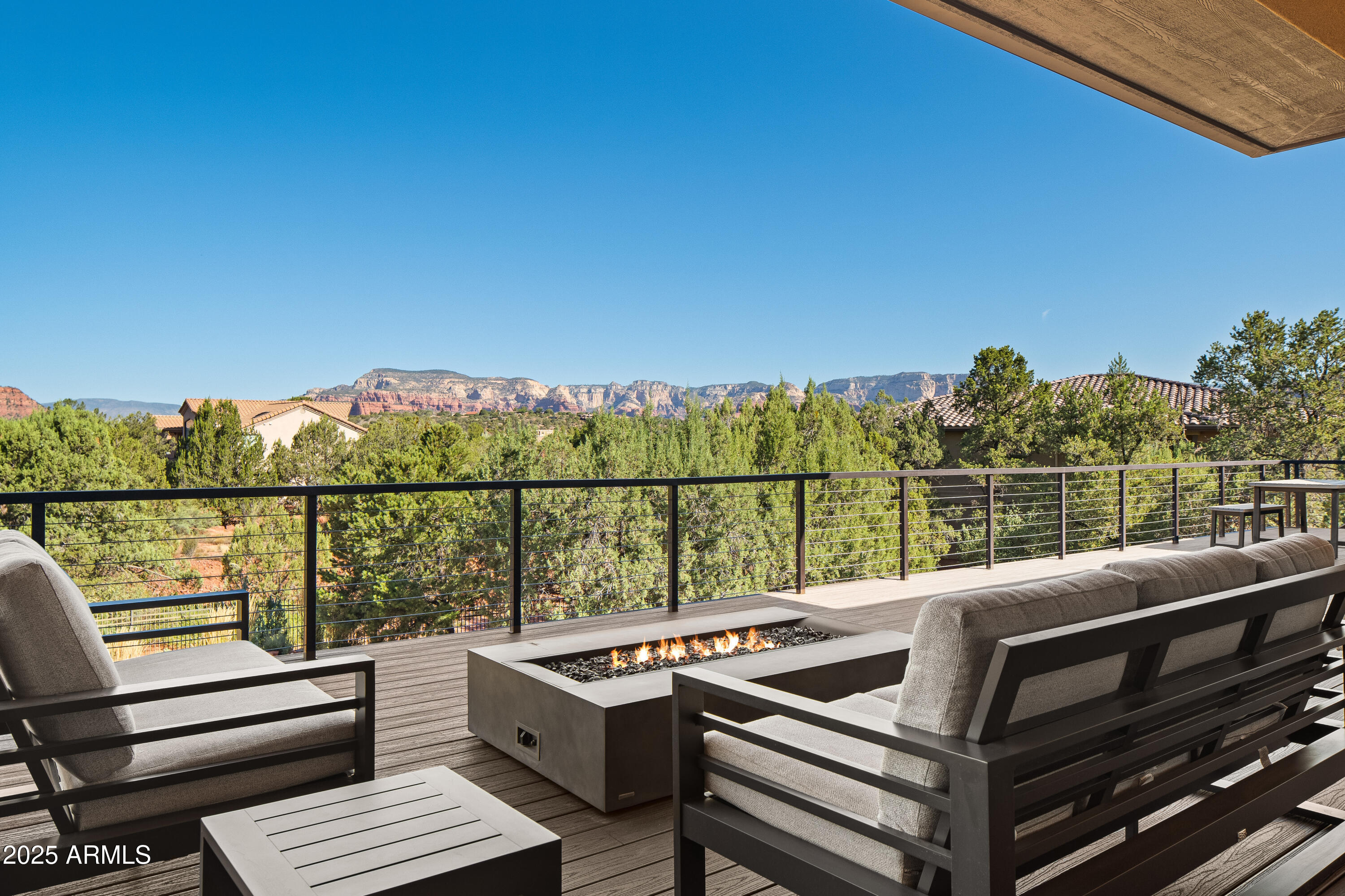150 Rimstone Circle Sedona, AZ 86336 - Photo 19 of 38 a view of a balcony with two chairs