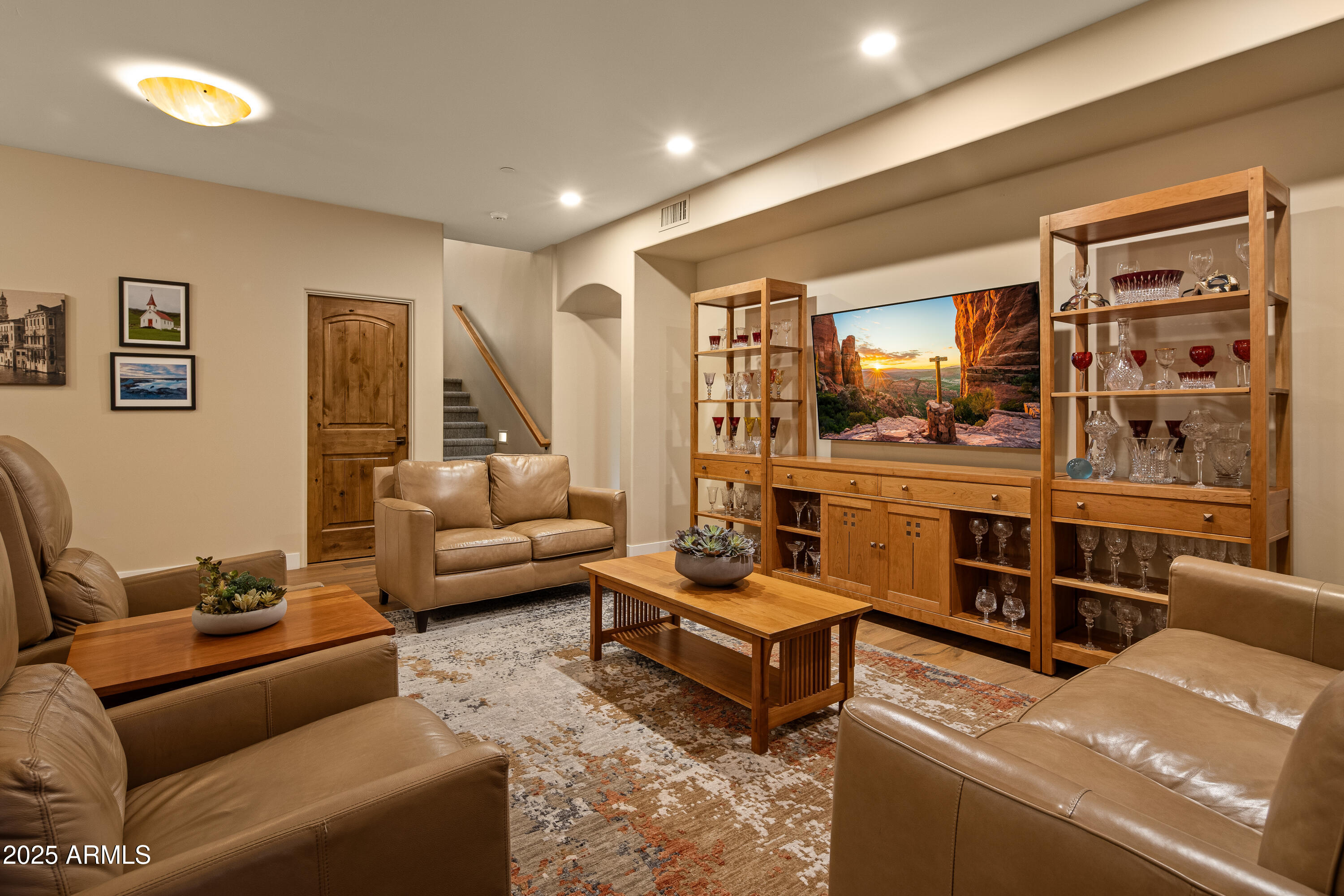 150 Rimstone Circle Sedona, AZ 86336 - Photo 25 of 38 a living room with furniture wooden floor and lamp