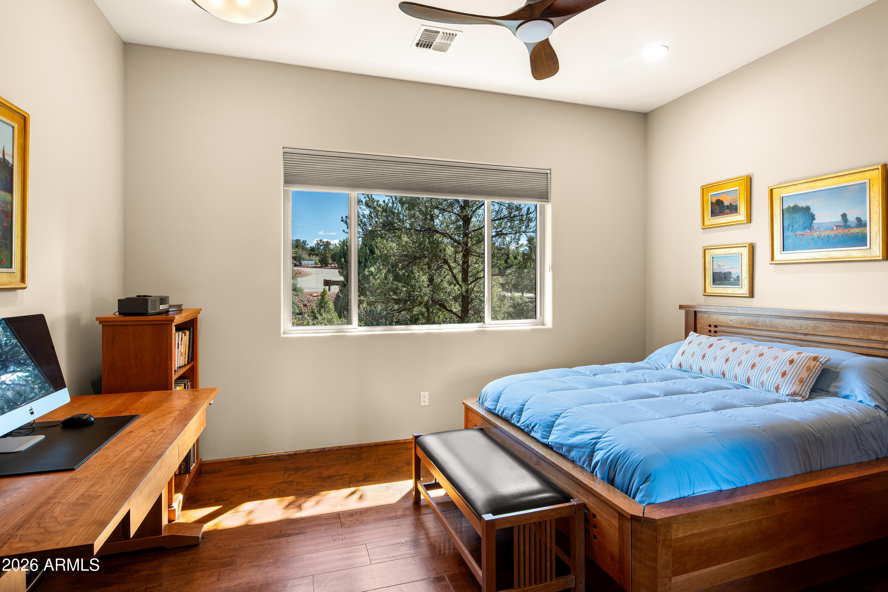 150 Rimstone Circle Sedona, AZ 86336 - Photo 29 of 38 a bedroom with a bed and a window