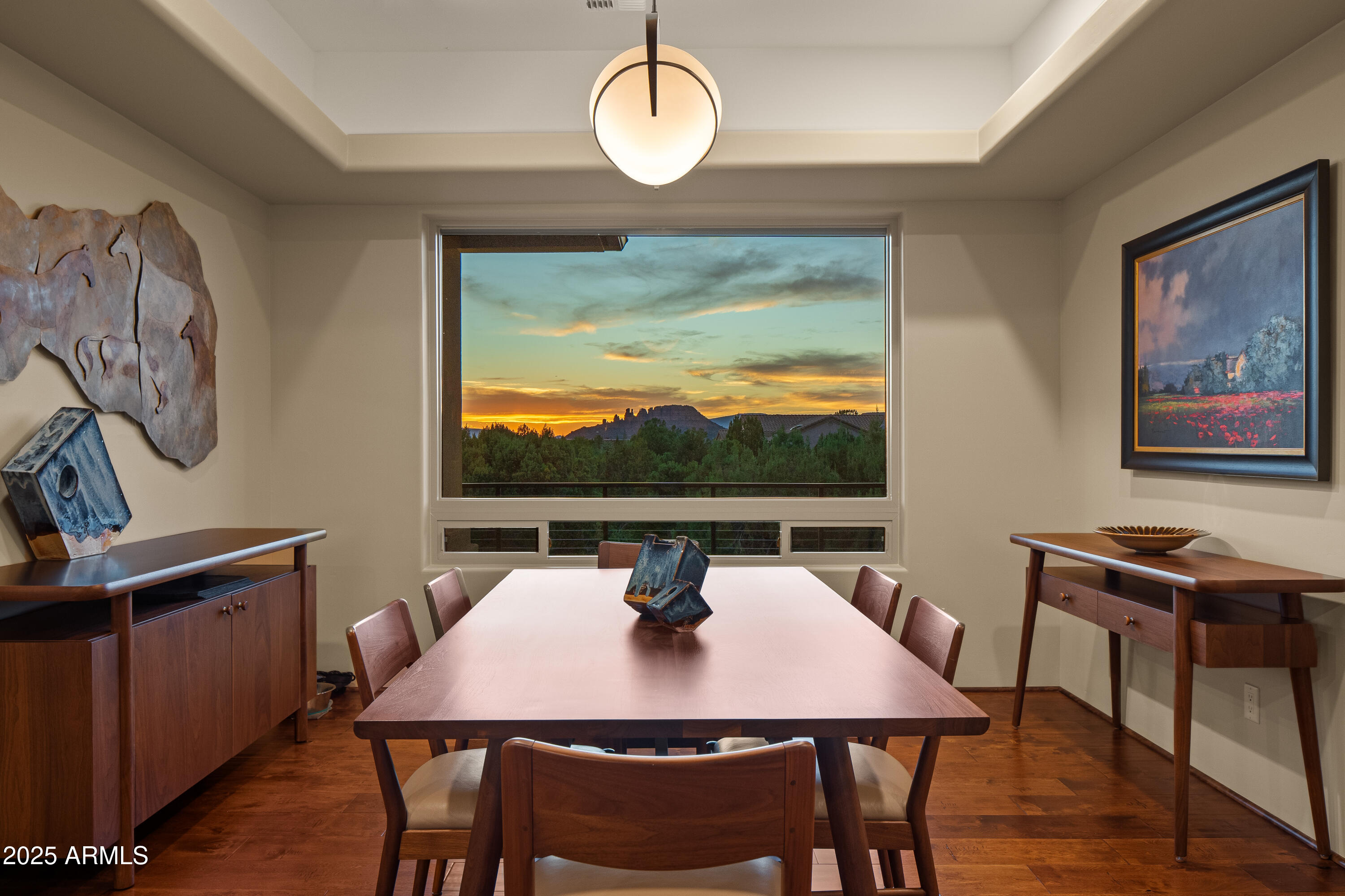 150 Rimstone Circle Sedona, AZ 86336 - Photo 6 of 38 a view of a dining room with furniture window and wooden floor