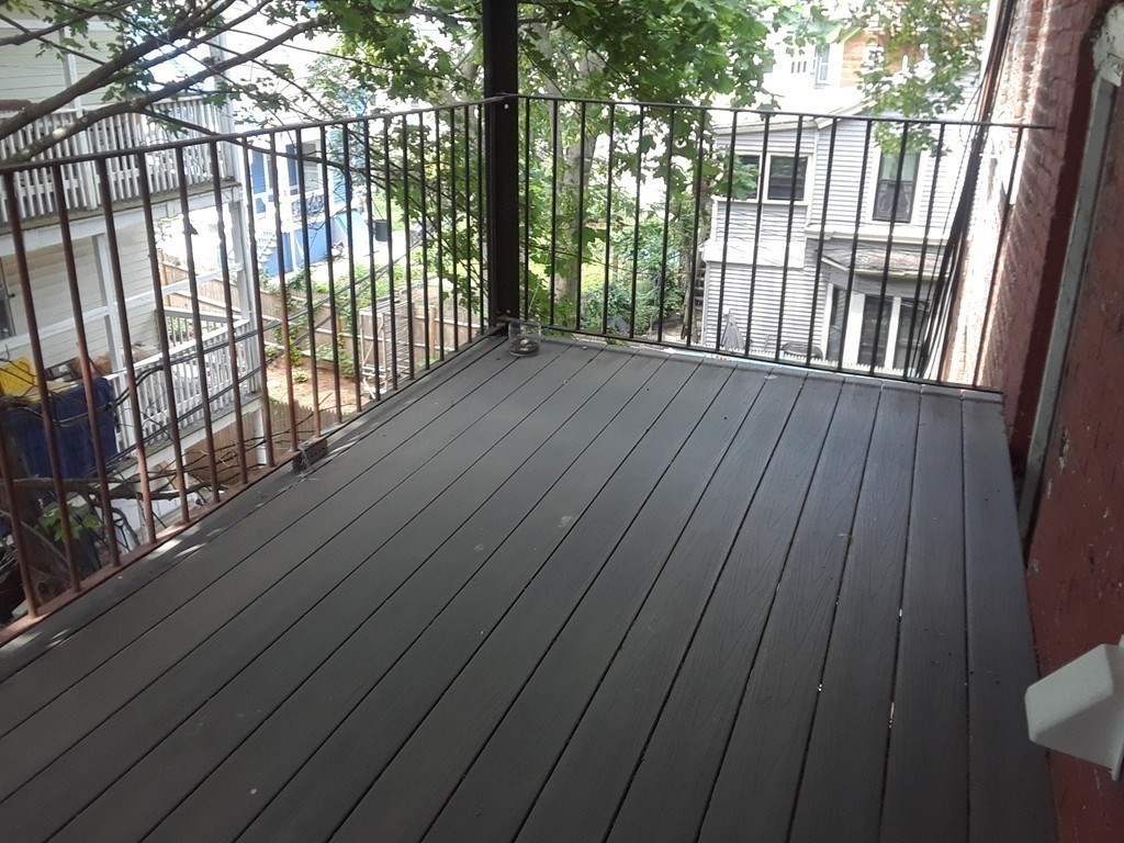 11 Forbes Street, Unit 2 Boston, MA 02130 - Photo 15 of 17 a view of balcony with wooden floor