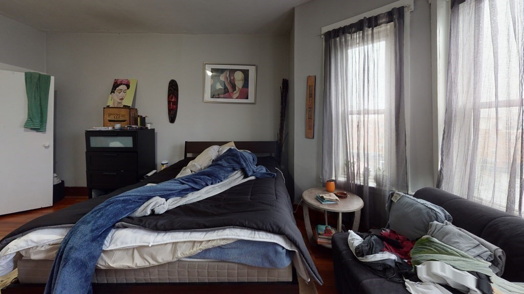 11 Forbes Street, Unit 2 Boston, MA 02130 - Photo 5 of 17 a living room with furniture and window