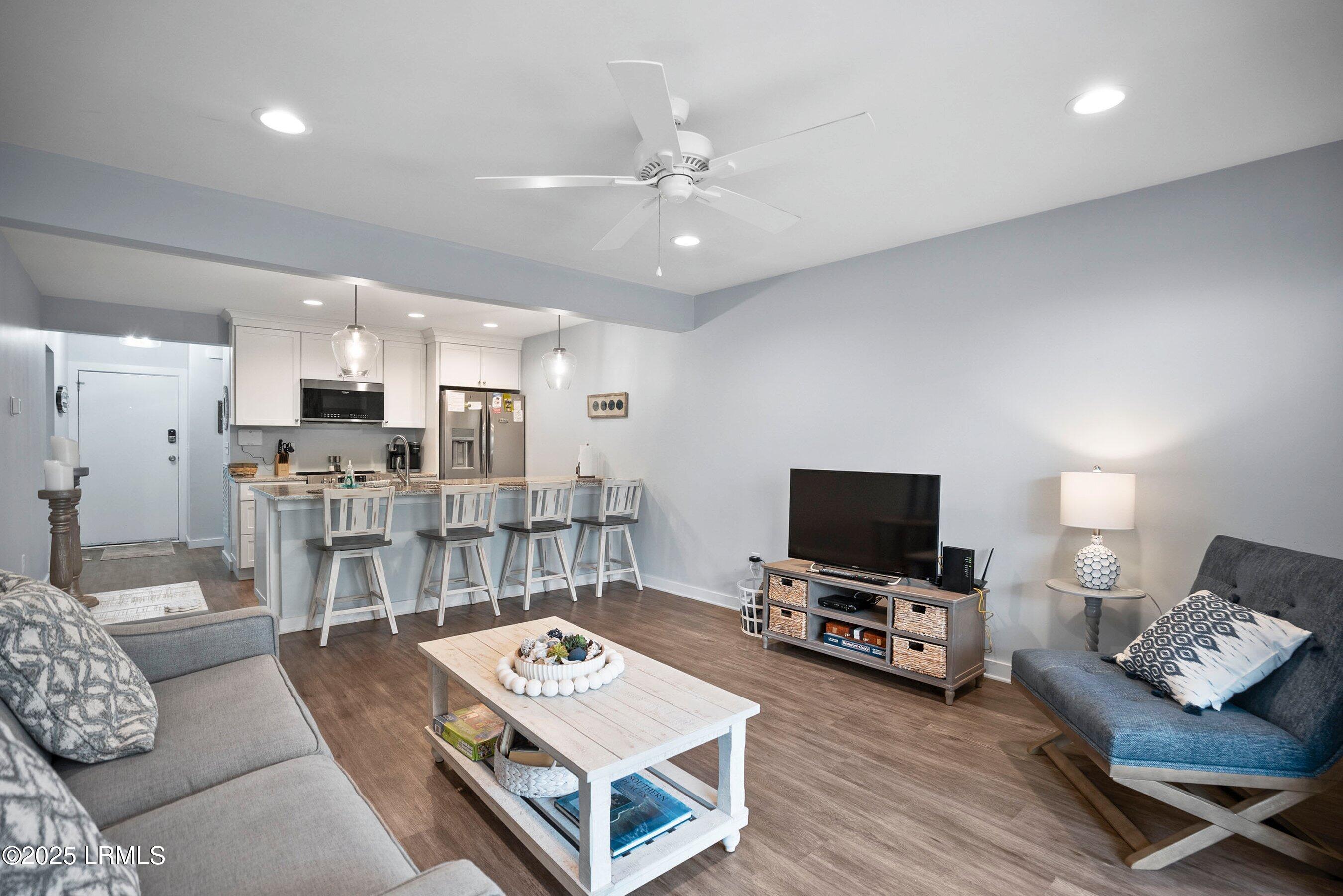 1 Cedar Reef, Unit F102 Harbor Island, SC 29920 - Photo 8 of 22 Living Area to Kitchen