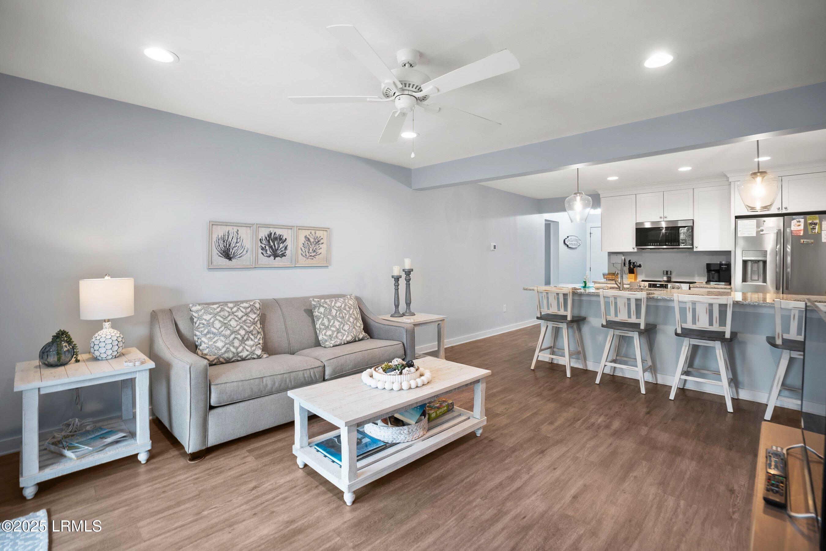 1 Cedar Reef, Unit F102 Harbor Island, SC 29920 - Photo 9 of 22 Living Area to Kitchen 2