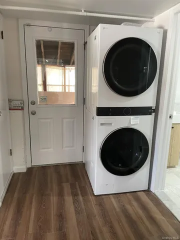 a view of a hallway with washer and dryer