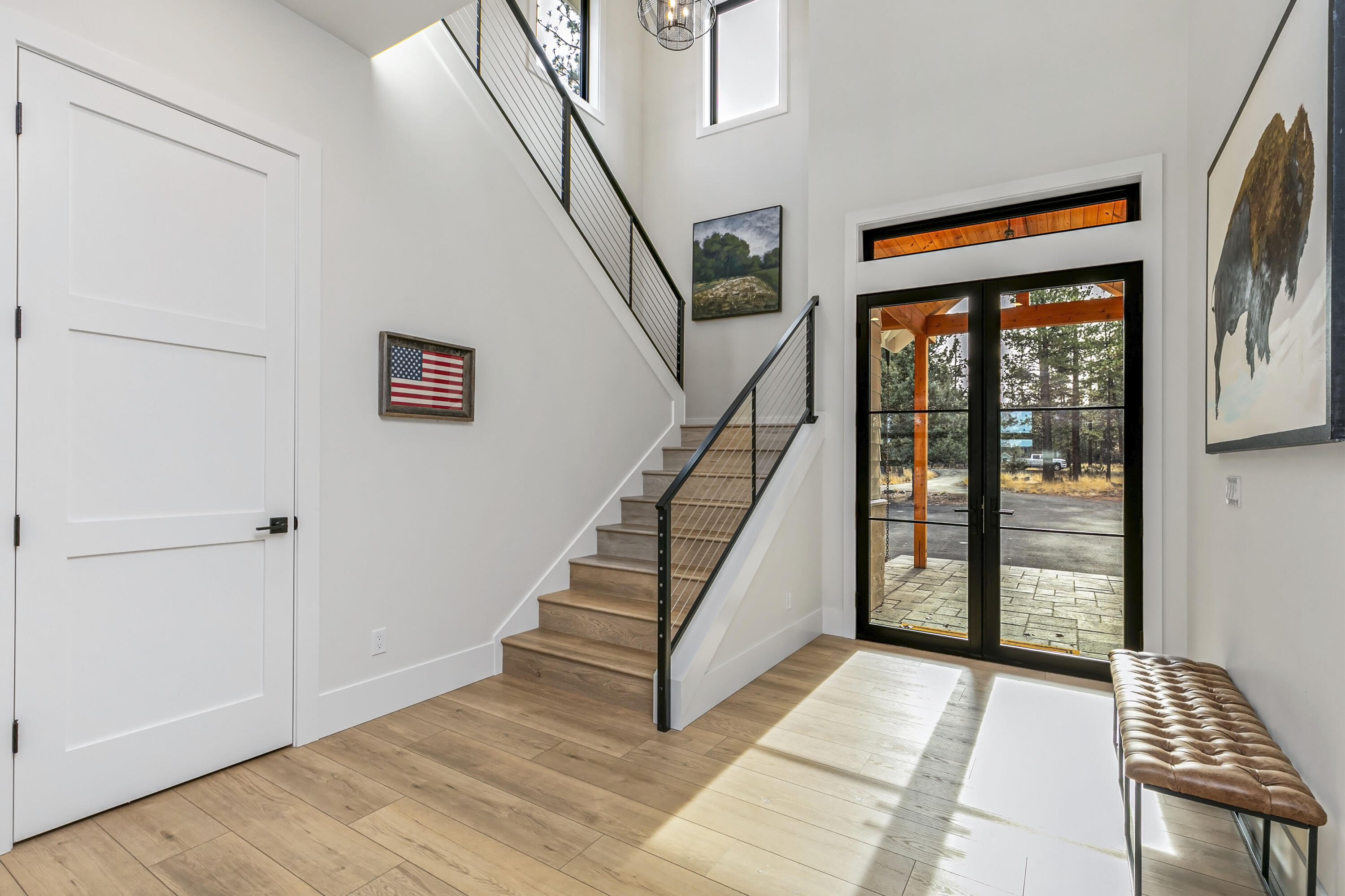 19550 Buck Canyon Road Bend, OR 97702 - Photo 17 of 28 a view of entryway with stairs and wooden floor