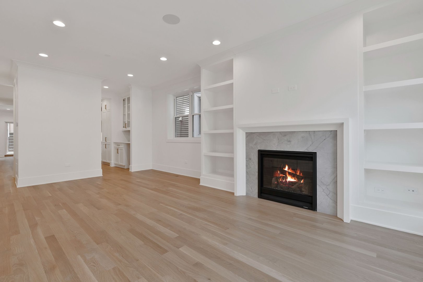 909 West Fletcher Street, Unit 1 Chicago, IL 60657 - Photo 11 of 22 a view of an empty room with fire place and a fireplace