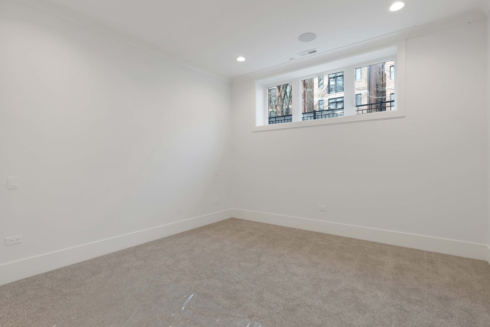 909 West Fletcher Street, Unit 1 Chicago, IL 60657 - Photo 18 of 22 wooden floor in an empty room