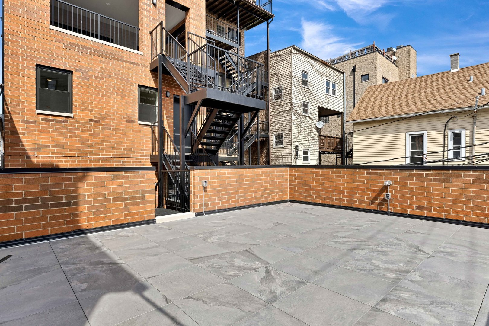 909 West Fletcher Street, Unit 1 Chicago, IL 60657 - Photo 22 of 22 a view of a building with many windows