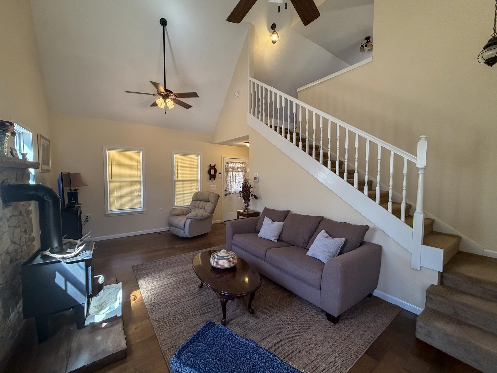 370 Cr 321 Road Iuka, MS 38852 - Photo 12 of 15 a living room with fireplace furniture and a wooden floor