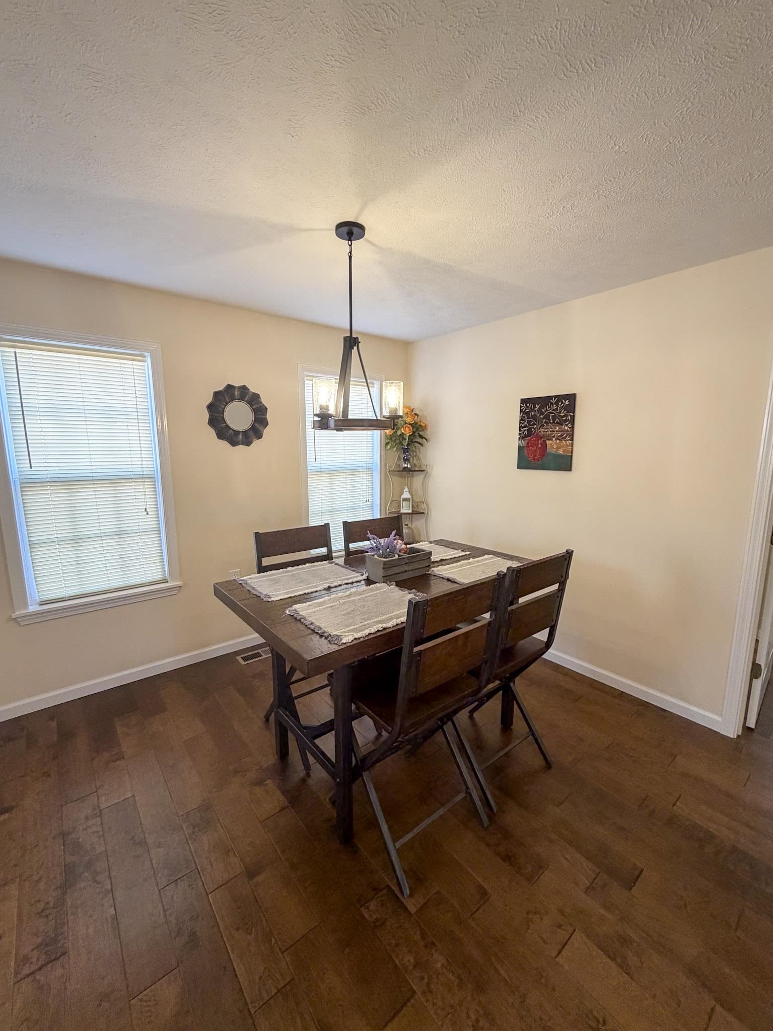 370 Cr 321 Road Iuka, MS 38852 - Photo 14 of 15 a dining room with a table and chairs