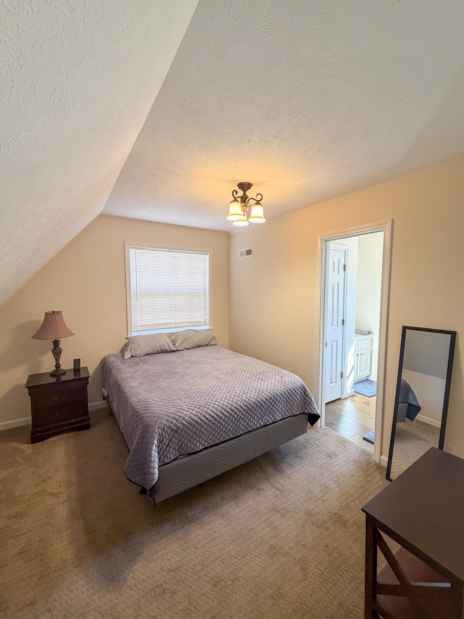 370 Cr 321 Road Iuka, MS 38852 - Photo 4 of 15 a bedroom with a bed and a couch