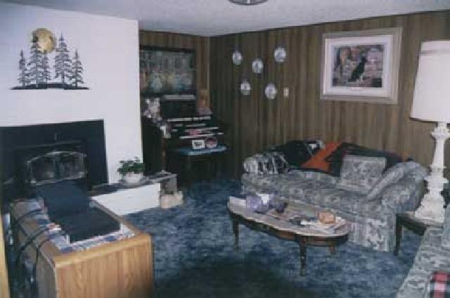 500 Livengood Road Cowiche, WA 98923 - Photo 3 of 9 a living room with furniture and a fireplace