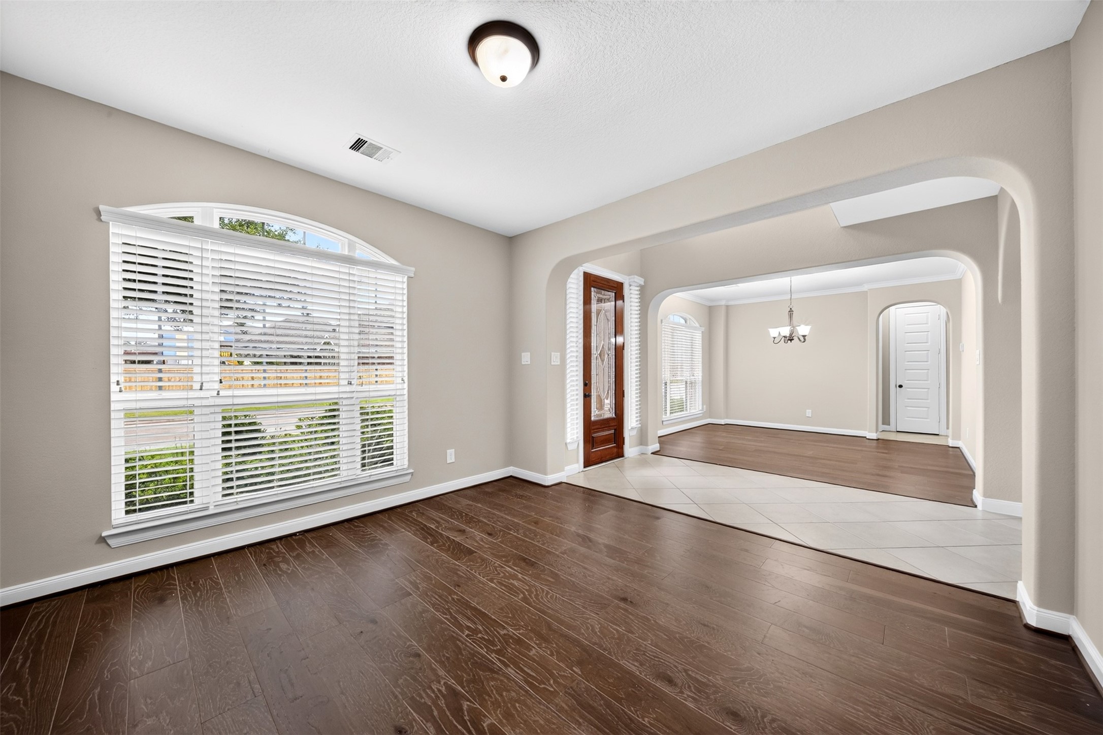 6234 Avon Landing Lane Spring, TX 77379 - Photo 12 of 49 At the front of the home, you have this large living room (which could be a flex space and utilized as the new homeowners see fit). It offer lots of natural light.