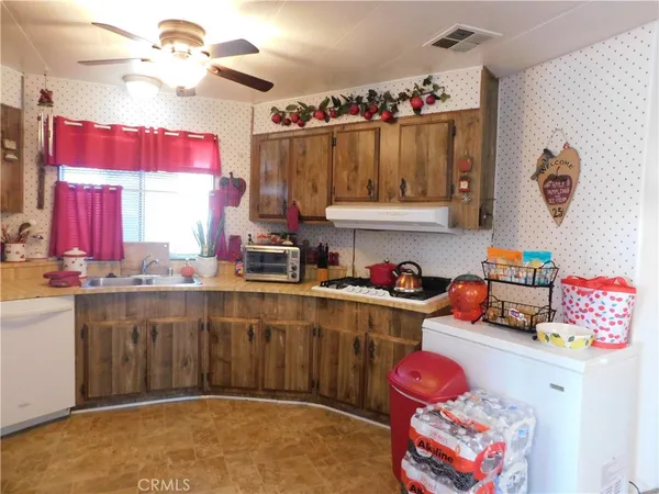 a workspace with furniture and a window