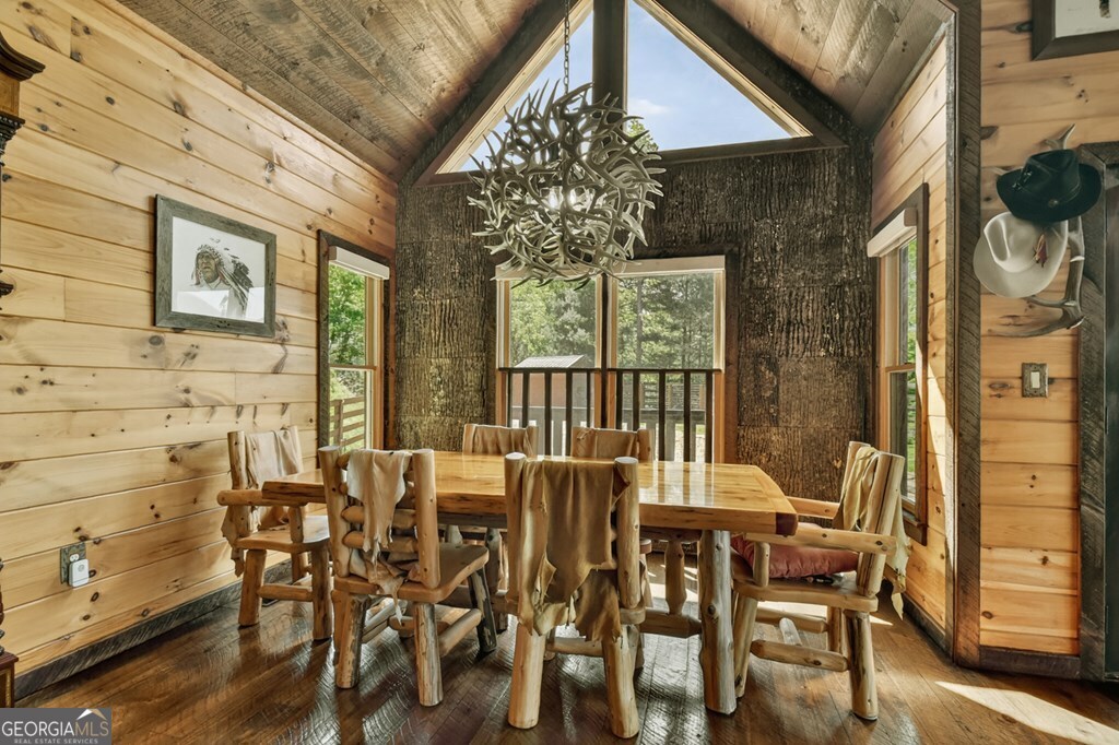 459 Quail Ridge Road Epworth, GA 30541 - Photo 11 of 73 a view of a dining room with furniture and window