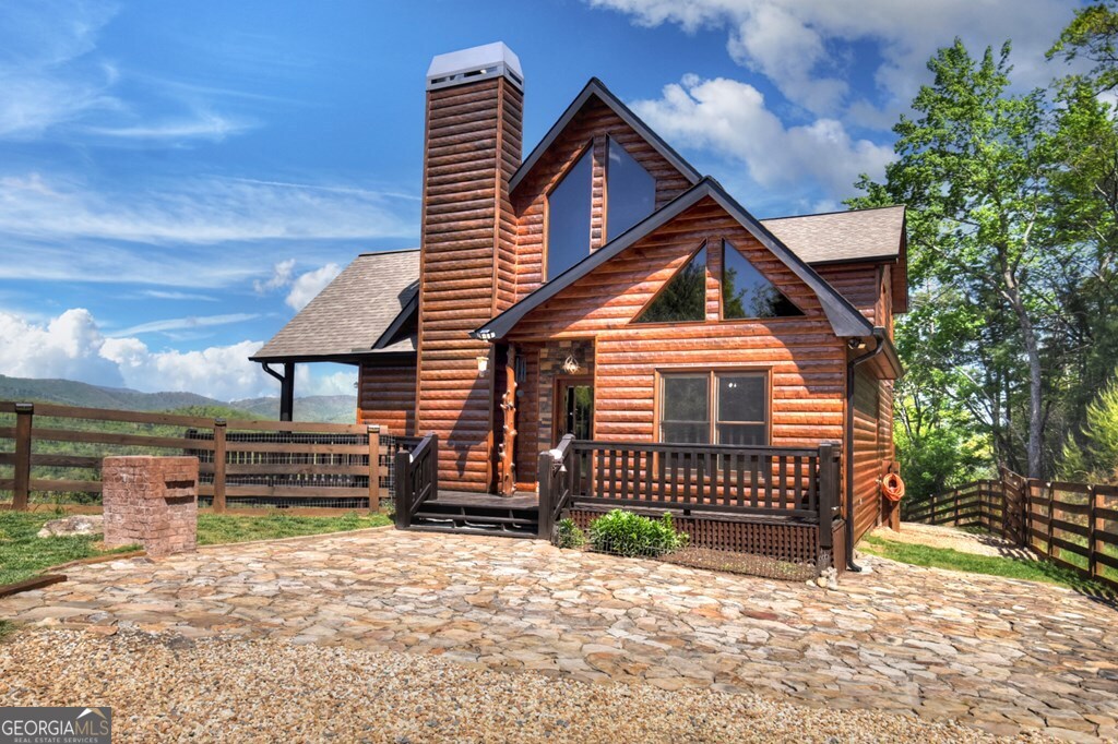 459 Quail Ridge Road Epworth, GA 30541 - Photo 33 of 73 a front view of a house with a yard
