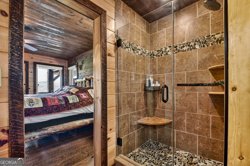 459 Quail Ridge Road Epworth, GA 30541 - Photo 50 of 73 a bathroom with a shower