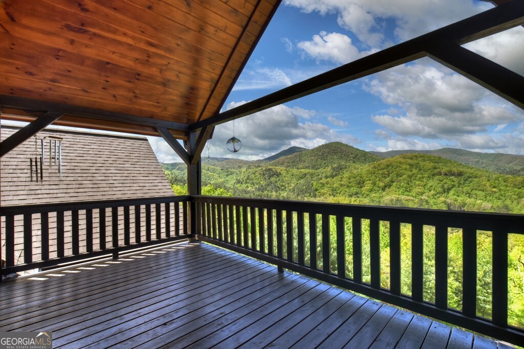 459 Quail Ridge Road Epworth, GA 30541 - Photo 57 of 73 a view of a balcony with wooden floor