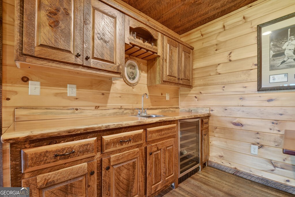 459 Quail Ridge Road Epworth, GA 30541 - Photo 65 of 73 a bathroom with a sink and a mirror